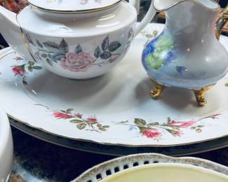 Beautiful antique tea pots, pitchers, plates, china.