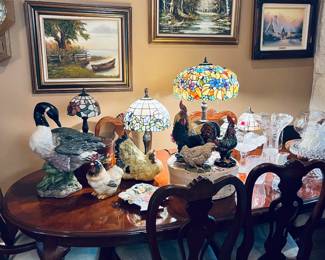 Tiffany style lamps and they are absolutely beautiful.  Gorgeous Dining table and chairs.  She clearly loved animals and has a ton of animal art.  Original paintings on the wall and they are stunning in person.