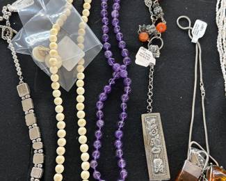 Left to right 9.25 necklace Asian inspired, vintage ivory, necklace and earrings gold plated, round amethyst beaded necklace 14 K clasp.