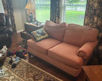 Loveseat, area rug
