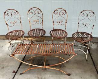 Four Metal Chairs and a Metal Bench