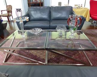 Natuzzi Editions "like new" pair of leather sofas and chaise, area rug, pair of chrome & glass coffee tables, bric-a-brac