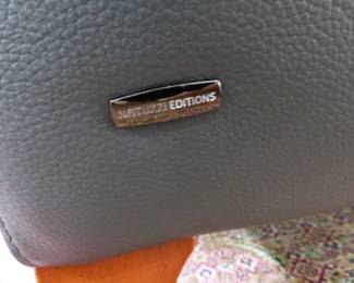 Natuzzi Editions "like new" pair of leather sofas and chaise