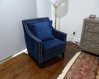 Single blue chair with nail head trim, gold branch floor lamp