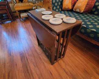 Fold out magazine rack.