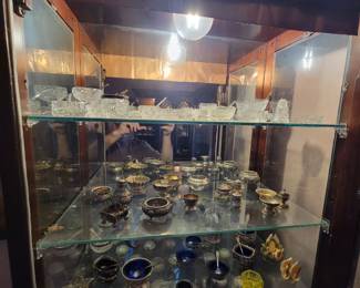 Lots of small trinkets, sterling silver and glass.