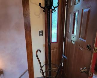 Cast iron coat rack/hall tree.