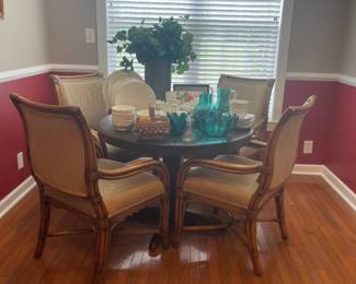 Wonderful rattan arm charms shown with oak kitchen table