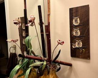 Oriental style arrangement, painted owls on wood