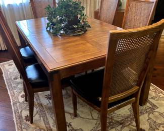 Henredon Dining Table - 66"L x 40"W and 6 chairs
Has glass top and 2 more leaves/18"W each