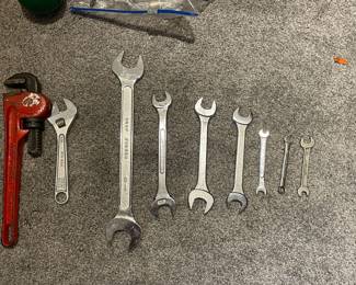 Pipe wrench, was $7, NOW $5.  Silver wrench,  was $4, NOW $2.  7 pc wrench set,  was $5, NOW $4