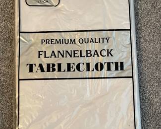 70" round flannel back tablecloth,  was $6, NOW $4
