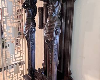 A Gazo Family ’The Californian’ 8ft tall ‘Open Well’ Case Clock Featuring Carved Oak Draped Figures with Etched Solid Brass Dial with Porcelain Numerals-(96”x27”x17”)..