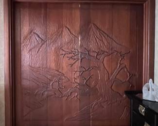 A set of Gorgeous Mid Century Carved Wooden Asian Bi-Fold Doors and Frame with Tree, Mountain and Asian Figures..
