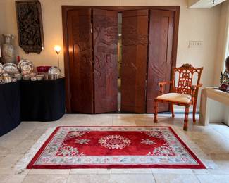 A set of Gorgeous Mid Century Carved Wooden Asian Bi-Fold Doors and Frame with Tree, Mountain and Asian Figures..