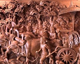 Meticulously Hand Carved Giant (Teak or Ramayana) Wooden Relief Carving-a captivating Scene as a ‘Processional of Celebration’ guides itself through a lush forest with Natives, Ox, Monkies and Horses..