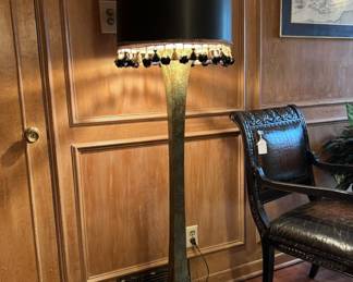 A Mid Century Modern Beautifully Patinated Bronze Sculpted ‘Stuart Ross James’ Floor Lamp on Ebonized Wooden Base..
