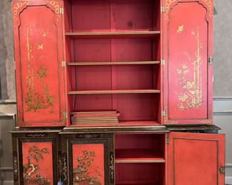 Elegant Mid Century Chinoiserie Breakfront/China Cabinet in Red and Gold Gilt with External and Interior Hand Painted Motifs with open Glass Shelves which Illuminate from above..