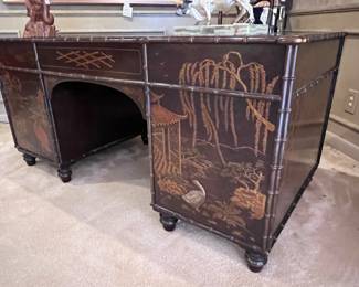 Vintage Henredon ‘Folio 10’ Double Pedestal Chinoiserie Desk with rectangular Top inset with Three (3) Gilt Tooled Leather writing surfaces- sits above Two (2) sets of Four (4) graduated Drawers flanking a Center Drawer, Trimmed with Faux Bamboo and had surfaces painted with Asian inspired Landscapes including Pagodas, Willow Trees and Cranes accompanied with matching Armchair..