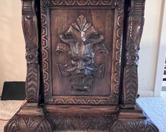 A Gazo Family ’The Californian’ 8ft tall ‘Open Well’ Case Clock Featuring Carved Oak Draped Figures with Etched Solid Brass Dial with Porcelain Numerals-(96”x27”x17”)..