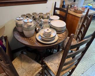 Table and 4 chairs 
Pottery set with dishes 