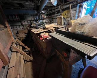 Lots of wood and jugs of rocks 
Lots of tools 