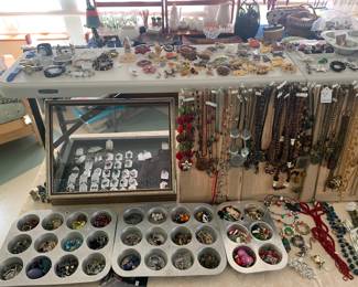 Sunroom 
Case Table-Jewelry stays with attendant in a bin. When you’re ready to cash out the bin is brought to the cashier. Sterling, Gold, & Costume Jewelry 