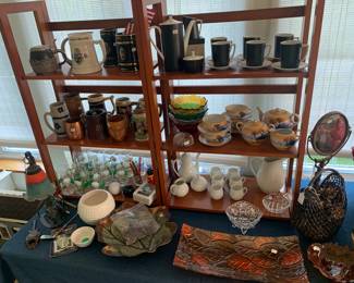 Sunroom 
Golf items, steins, tea sets, fall decor