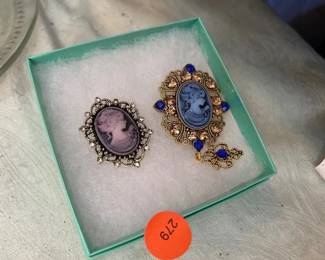 2 BROOCHES