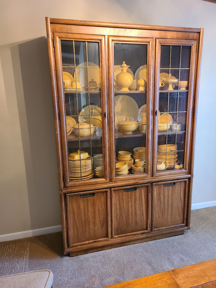 Beautiful vintage original Homer Laughlin Fiesta from 1940s and Mid-Century china cabinet. Matching table and chairs available but priced separately. 