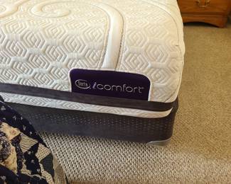 King Serta iComfort firm mattress with memory foam, includes box springs and metal frame.