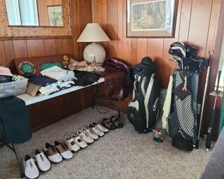 Full set of women's clubs with bag, variety of golf shoes, accessories, hats, visors, towels, travel cases.