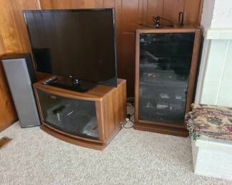 50" LG TV, Sony DVD player, TV cabinet and stereo cabinet, all pieces sold individually.