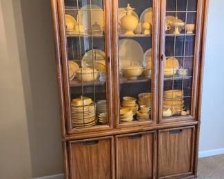 Beautiful vintage original Homer Laughlin Fiesta from 1940s and Mid-Century china cabinet. Matching table and chairs available but priced separately.