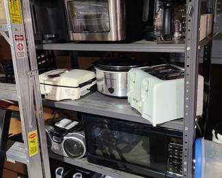 Many small appliances and some shelving available