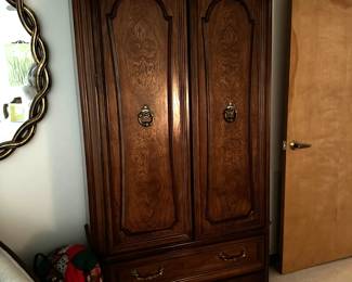 Wardrobe armoire.  Holds lots.