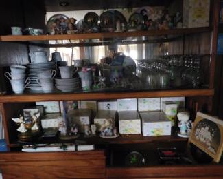 Hummels, snowglobes and precious moments in boxes