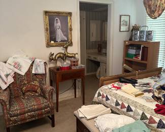 Comfy chair and antique Singer sewing machine. 