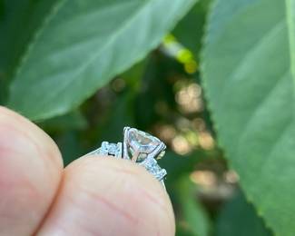 #148 - One, round European cut diamond of about 1.54 ct (VVS2, L-N color range) One platinum fifty-seven stone, cast made ring. 14 round full cut diamonds 1.50mm. (SI 1 - GH color range). 42 baguette cut diamonds (SI 1- GH color range) - Size 5- Appraisal & price available upon request.