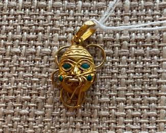#154 - $60 - 14kt gold Egyptian charm or pendant face 2.42 gr