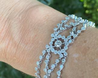 #149 - 18kt white gold ornate tennis bracelet, with one hundred ninety-six stone. 28.11 dwt. Appraisal & price available upon request. Size 7” L