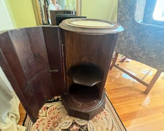 $150 round fluted tall cabinet with marble inserted top early 20th century 14R 33 T