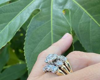 #150 - 14kt yellow gold fifteen stone,cast made ring, with 24kt white gold top. fourteen, round, full cut diamonds 0.25ct each. (SI 1- F-H range) & one round brilliant cut diamond of about .51 ct (SI-2 - F-H range). Size 10- Appraisal & price available upon request.