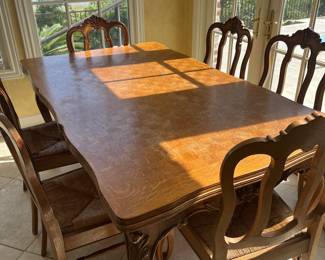 $1,050 French parquet table with built in leaves and 6 chairs 67W 39D 30T