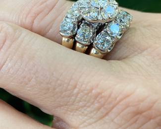 #150 - 14kt yellow gold fifteen stone,cast made ring, with 24kt white gold top. fourteen, round, full cut diamonds 0.25ct each. (SI 1- F-H range) & one round brilliant cut diamond of about .51 ct (SI-2 - F-H range). Size 10-Appraisal & price available upon request.
