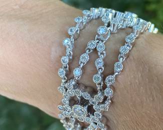 #149 - 18kt white gold ornate tennis bracelet, with one hundred ninety-six stone. 28.11 dwt. Appraisal & price available upon request. Size 7” L