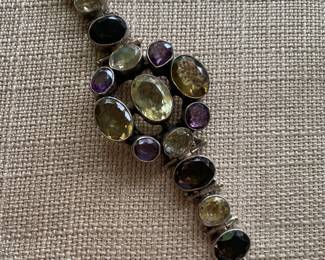 #157 - $70 - Sterling & multi stone bracelet