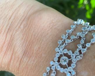 #149 - 18kt white gold ornate tennis bracelet, with one hundred ninety-six stone. 28.11 dwt. Appraisal & price available upon request. Size 7”L