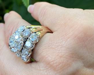 #150 - 14kt yellow gold fifteen stone,cast made ring, with 24kt white gold top. fourteen, round, full cut diamonds 0.25ct each. (SI 1- F-H range) & one round brilliant cut diamond of about .51 ct (SI-2 - F-H range). Size 10- Appraisal & price available upon request.