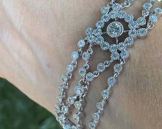 #149 - 18kt white gold ornate tennis bracelet, with one hundred ninety-six stone. 28.11 dwt. Appraisal & price available upon request. Size 7” L